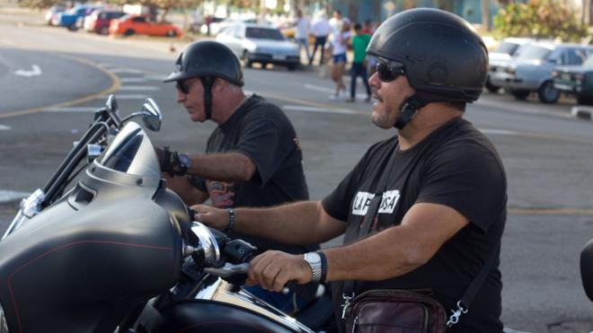 Ernesto Guevera on a motorbike in Cuba