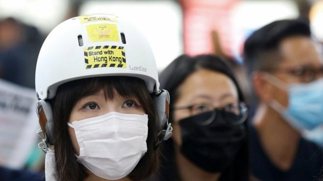 A protester at Hong Kong airport, 9 August 2019