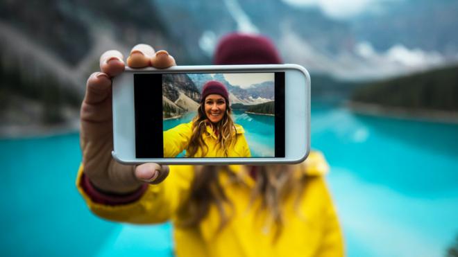 Woman taking a selfie