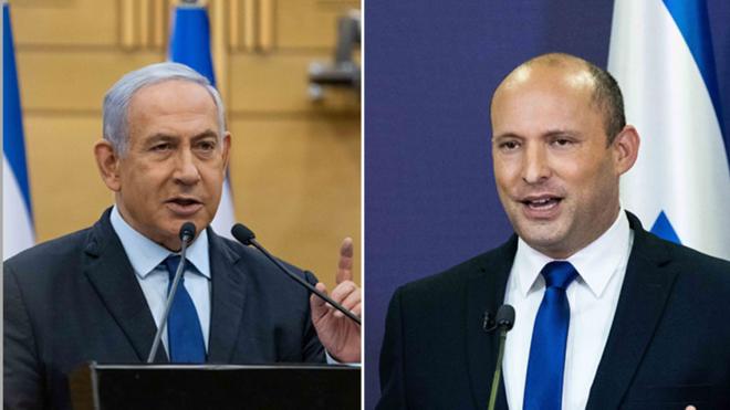 Биньямин Нетаньяху (слева) и Нафтали Беннет в Кнессете, 30 мая 2021 г.