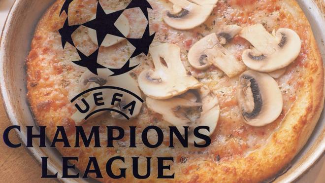 Pizza with Champions League logo.