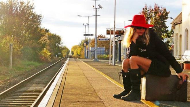 Woman at railway station