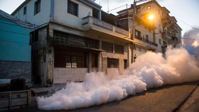 Health authorities with the help of the Cuban army fumigate against the Aedes aegypti mosquito to prevent the spread of zika, chikungunya and dengue in a street of Havana, on February 23, 2016.