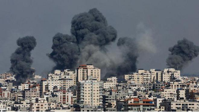 Smoke rises following Israeli strikes in Gaza, October 7, 2023