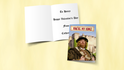 An open greetings card showing the inside with a written message and the front cover that features King Henry andwith the wording "You're my King" above it