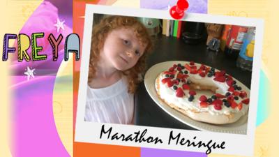 A girl (Freya) stands next to a plateful of fruit meringue, covered in strawberries and blueberries.