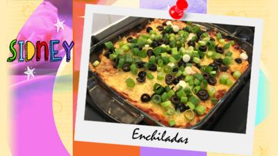 A picture of a dish full of enchiladas sent in by Sidney.