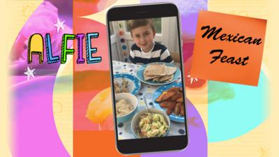 A boy surrounded by plates of delicious food.