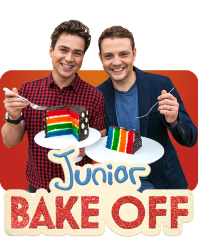 Sam and Mark hold two pieces of brightly coloured rainbow cake on a plate.