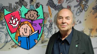 Sir Quentin Blake with the Blue Peter Book badge.