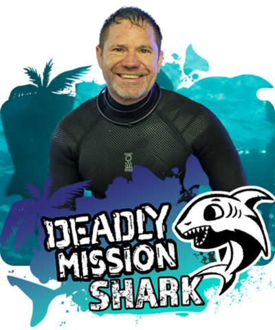 Steve Backshall, surrounded by water and sharks
