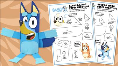 Paper tube craft of Bluey, next to instruction cards.