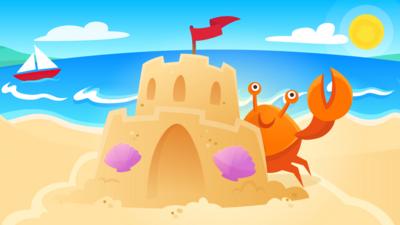 Sandcastle and crab on a beach
