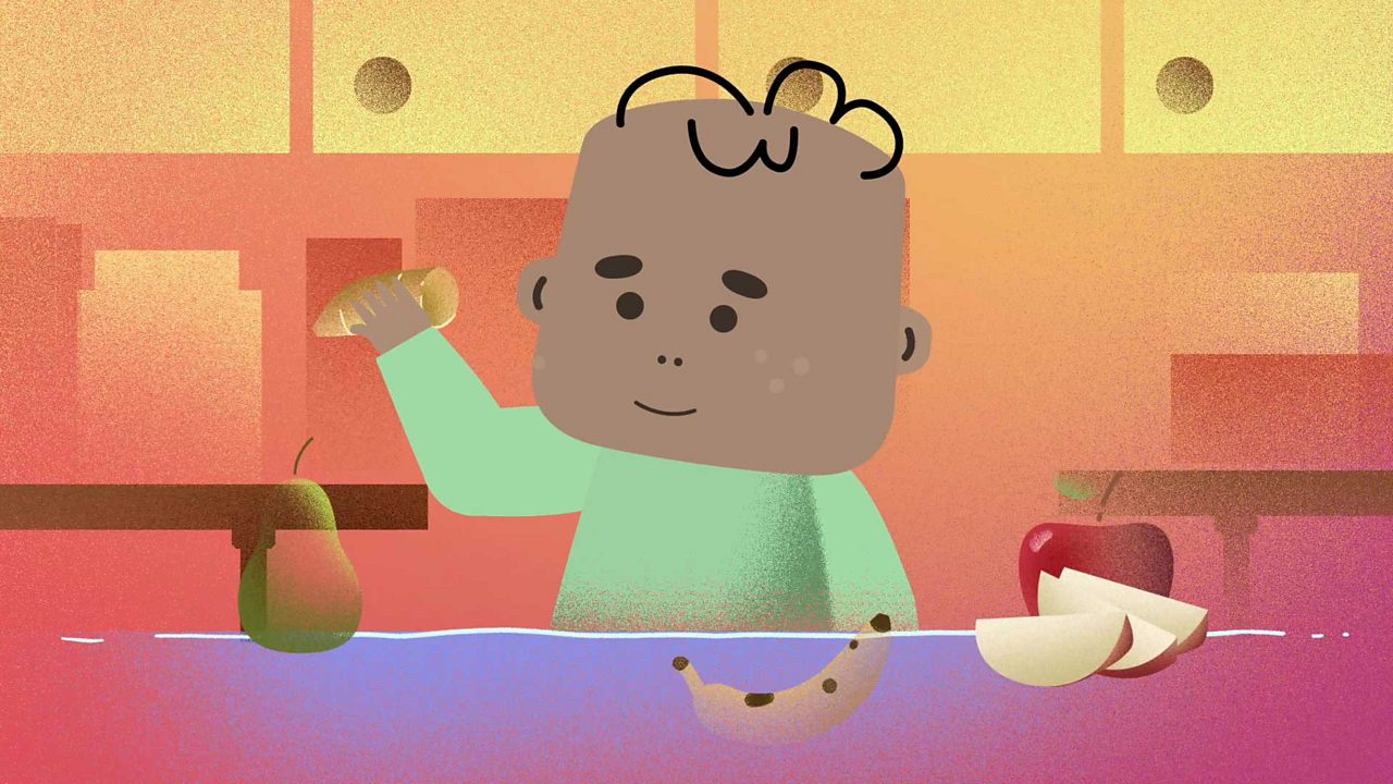 A cartoon baby picking up a sweet potato amongst a few different fruits and vegetables.