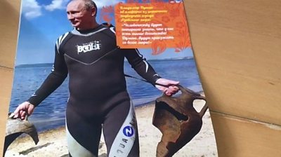 Vladimir Putin in a wetsuit
