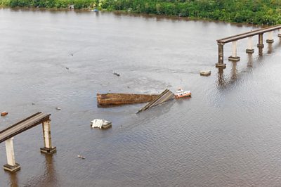 A bridge over the Moju River is seen after collapsing in Acara, Para state