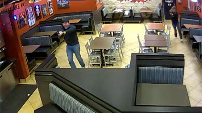 Two cops at restaurant stop robbery