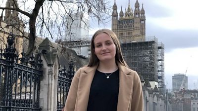 Morgan outside the Houses of Parliament