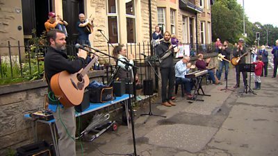 A band performed in Glasgow's Dumbarton Road to say thanks to the NHS