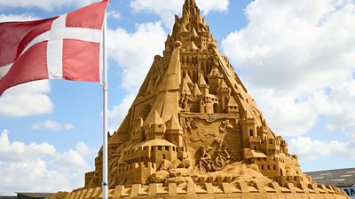 Sandcastle and the Danish flag