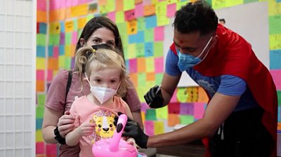 Child receiving jab