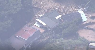 Aerial footage of damaged homes