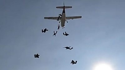 People jumping out of a plane