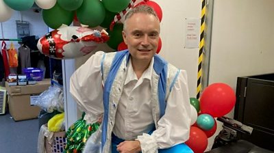 David Allard poses in panto outfit