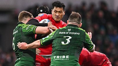 Sam Lousi of Scarlets is tackled by Cian Prendergast and Jack Aungier of Connacht