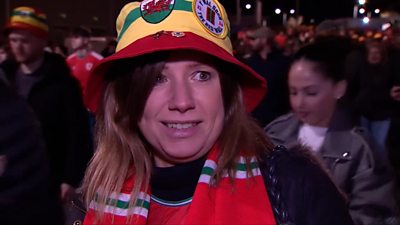 Wales' fans react to their team losing