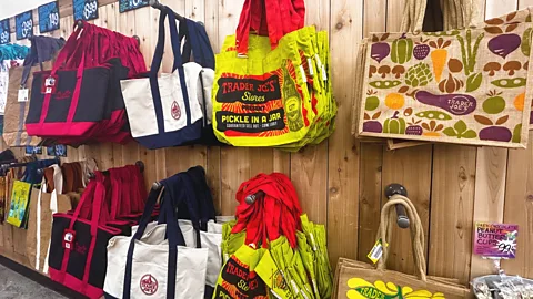 Trader Joe's bags hanging in store (Credit: Getty Images)
