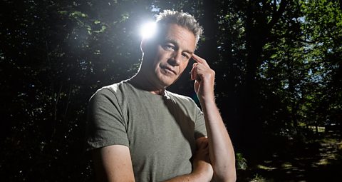 Chris Packham looks at the camera in the New Forest for his BBC documentary on autism