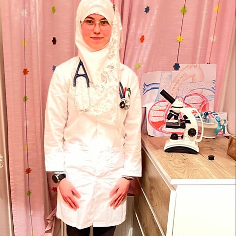 young girl dressed as a doctor