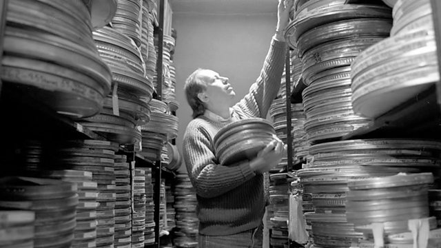Decorative image of man searching film archive