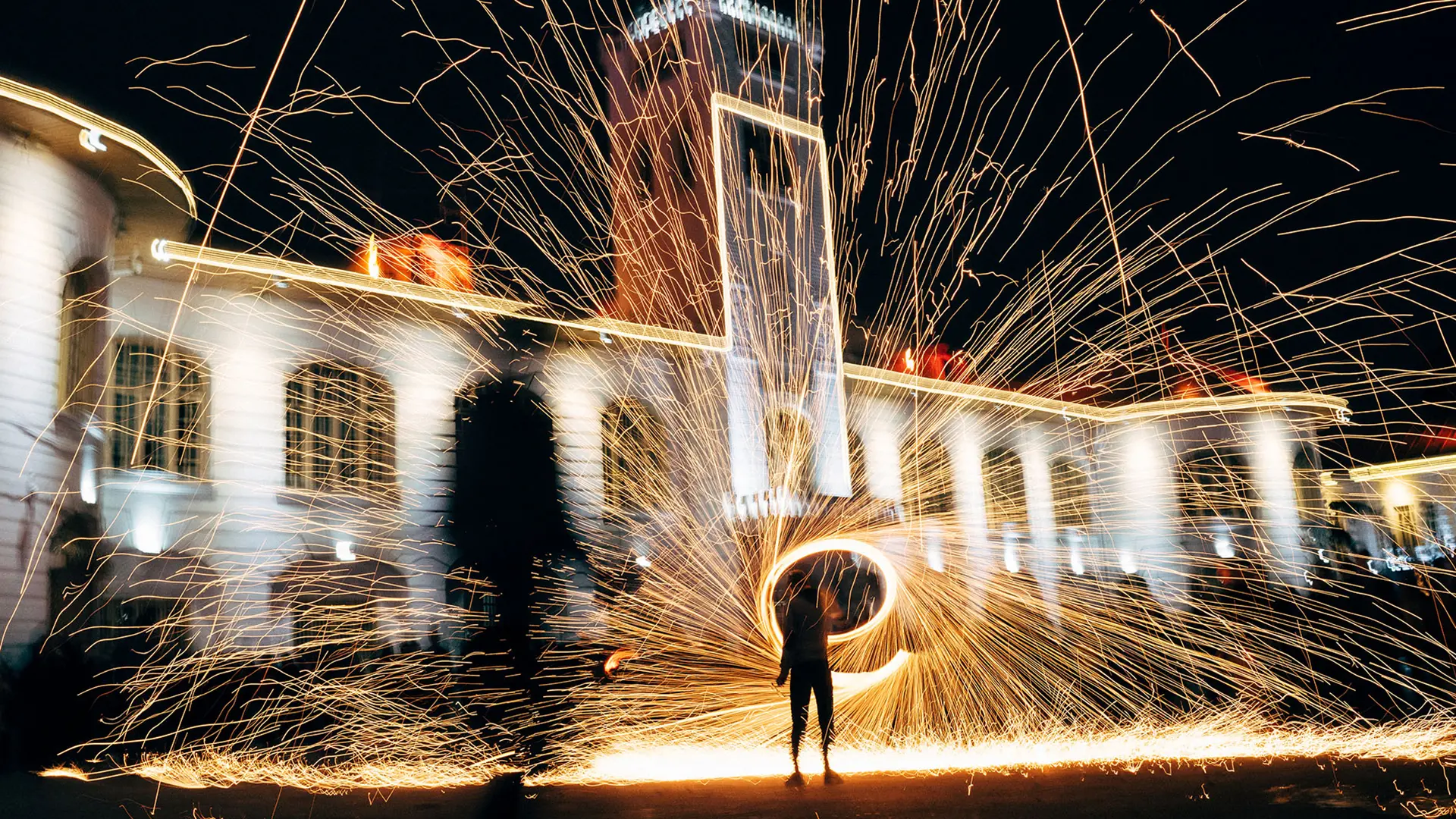 A young Iranian boy is spinning fireworks as part of Chaharshanbe Suri, Nowruz