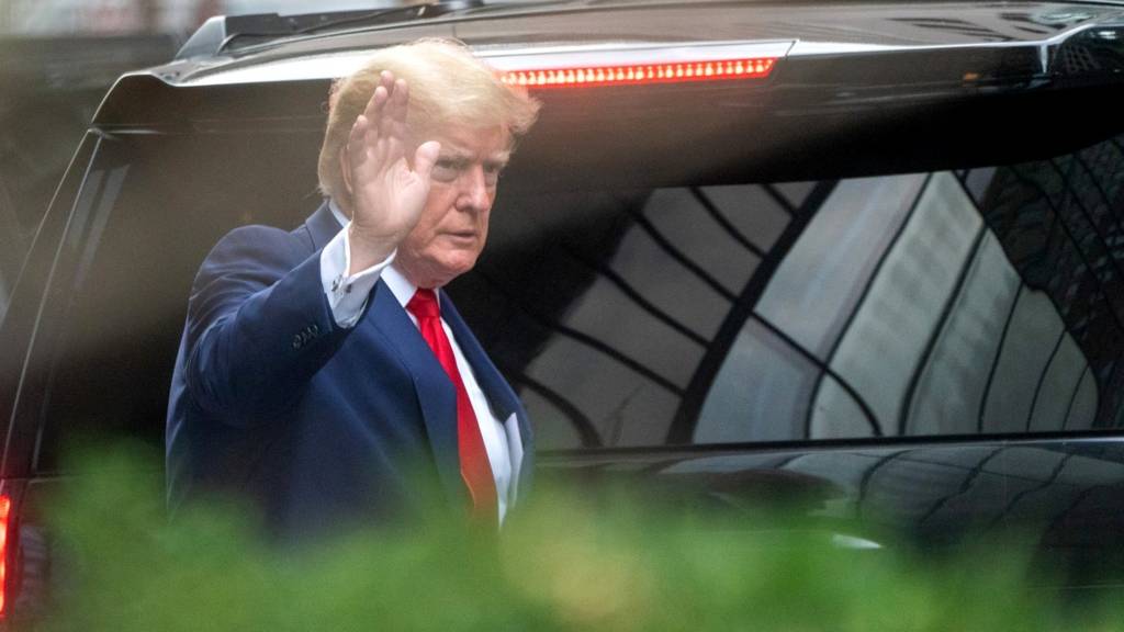 Trump waving