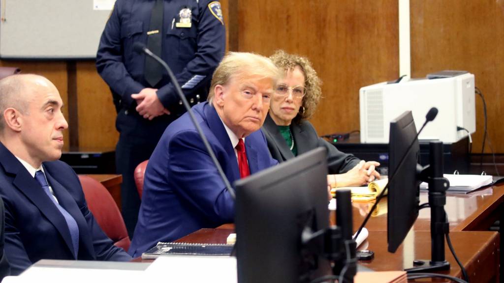 Former U.S. President Donald Trump appears with his lawyer Susan Necheles for a pre-trial hearing in a hash money case in criminal court on March 25, 2024 in New York City.