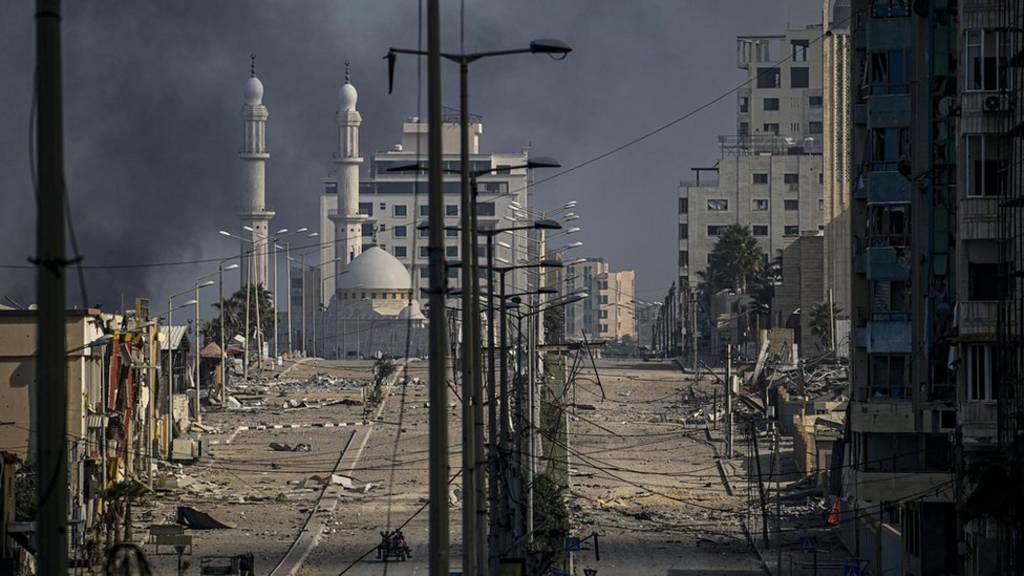 A general view of debris at a deserted street following Israeli air strikes in Gaza City