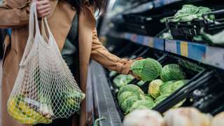 Women picking up vegtable