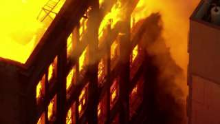 Flames engulf a large building in Sydney