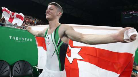 Rhys McClenaghan celebrates after his Commonwealth Games pommel horse gold for Northern Ireland in 2018