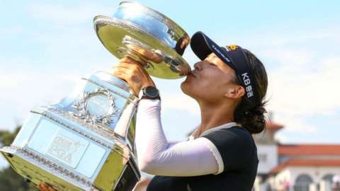 In Gee Chun kisses the Women's PGA Championship trophy