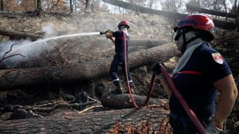 Firefighters battle the blaze in France