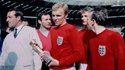 Bobby Moore and the World Cup trophy