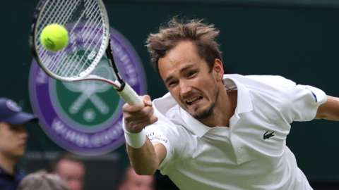 Daniil Medvedev competing at Wimbledon