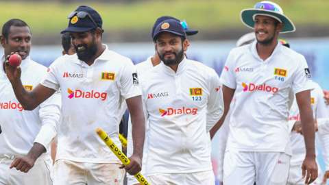 Sri Lanka players celebrate beating Australia in the second Test