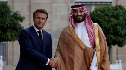 French President Emmanuel Macron welcomes Saudi Crown Prince Mohammed bin Salman for a working dinner at the Elysee Palace in Paris