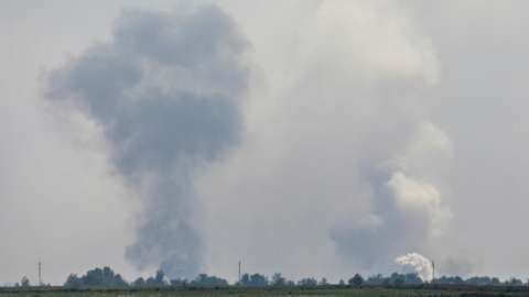 A view shows smoke rising above the area following an alleged explosion in the village of Maiske in the Dzhankoi district, Crimea