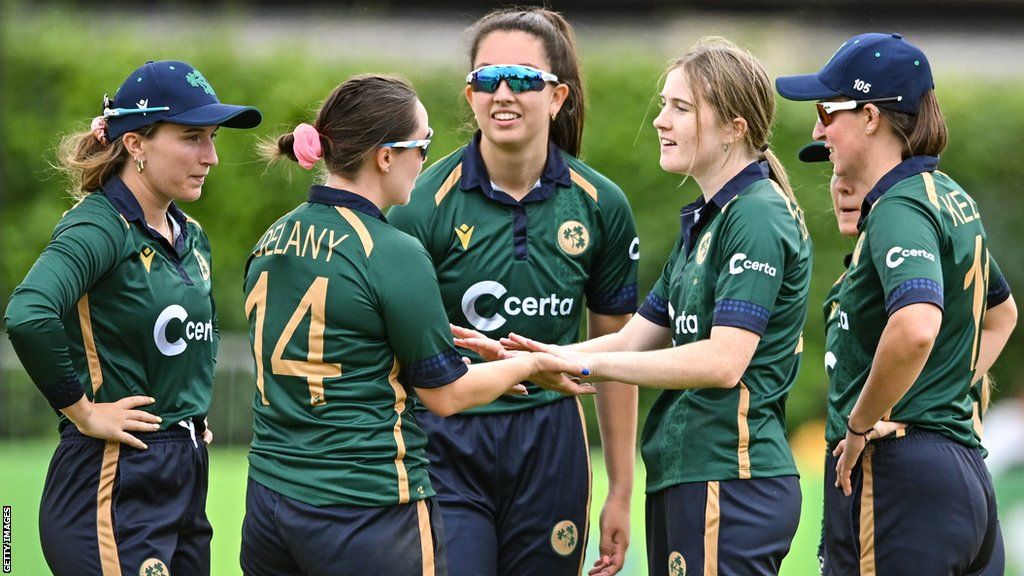 Skipper Laura Delany congratulates Georgina Dempsey after the youngster took a wicket in the ODI game against Australia in Dublin on 25 July