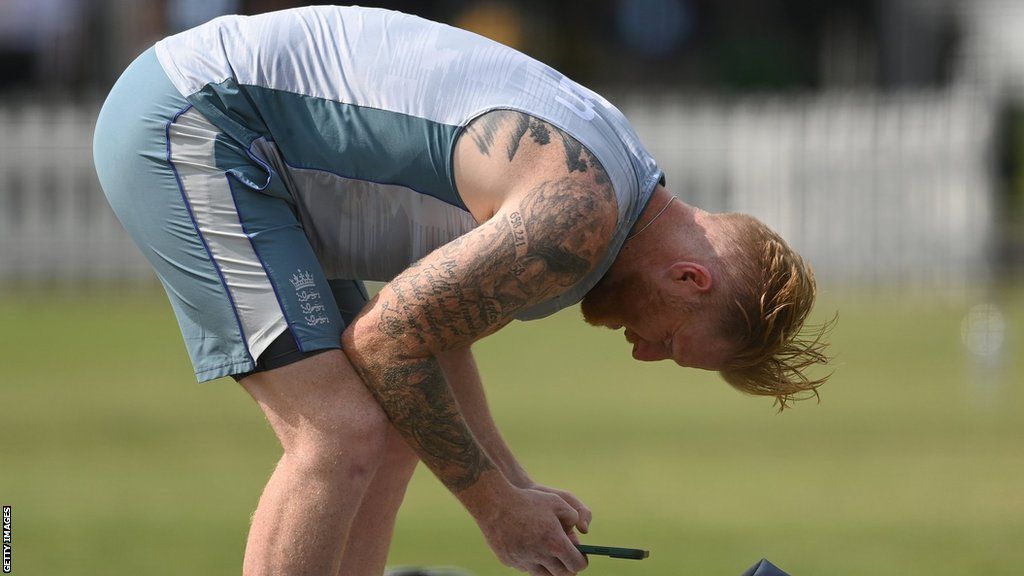 England captain Ben stokes looks at his phone